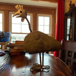 Weird strange little chicken statue